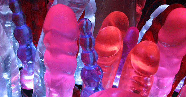 A range of colorful dildos are shown. 