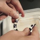 A nitinol implant extends from a flaccid resting state when heated.