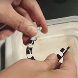 A nitinol implant extends from a flaccid resting state when heated.