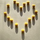 Tablets are placed in the shape of a heart.