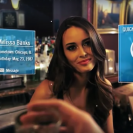 A woman appears with digital information overlayed in her physical environment.
