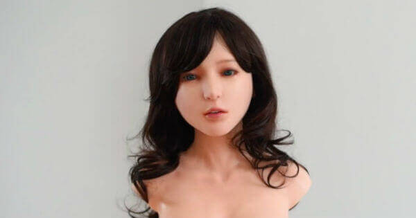 A dark-haired robotic head of a Chinese-made gynoid.