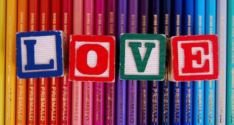 Screenshot showing colorful pencils with LOVE letters engraved on dice