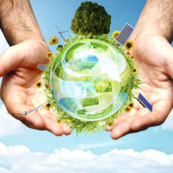 hands holding green orb with green energy