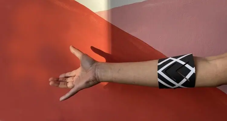 Screenshot of right hand with a band wrapped on it