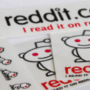 A pile of stickers that have the Reddit logo and says "I read it on reddit".